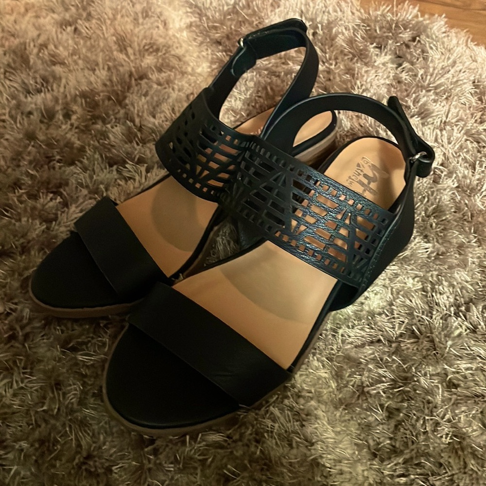 Black and tan heeled sandals